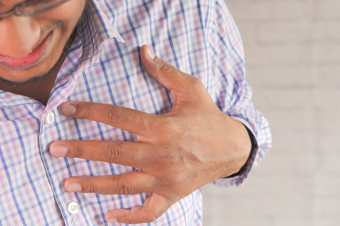 Heart attack symptom, man with chest pain, cardiovascular disease, health care, medical help.